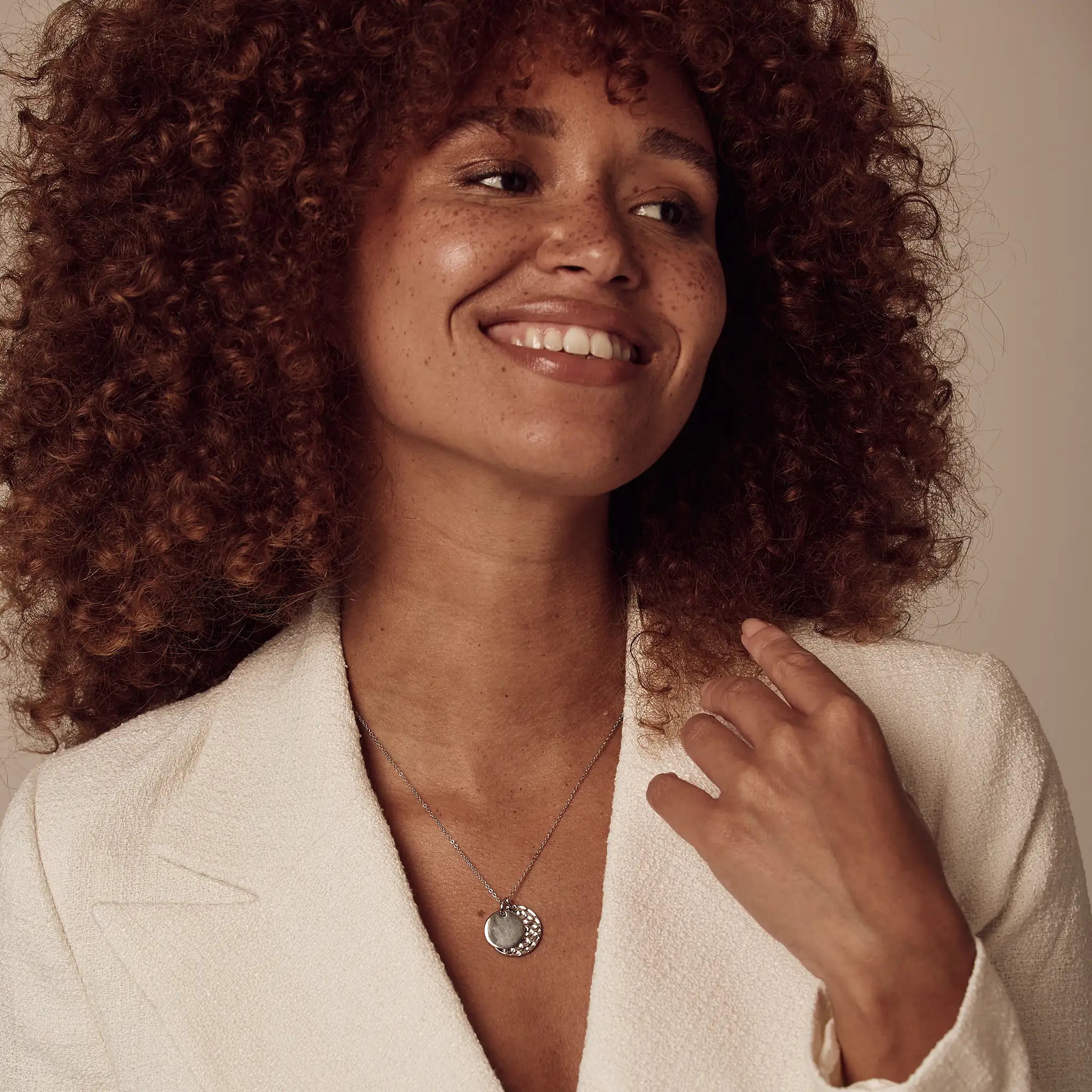 Layered styling of Double Disc Necklace in Sterling Silver, demonstrating the size contrast between hammered and engraved discs engraved necklace gifts sterling silver