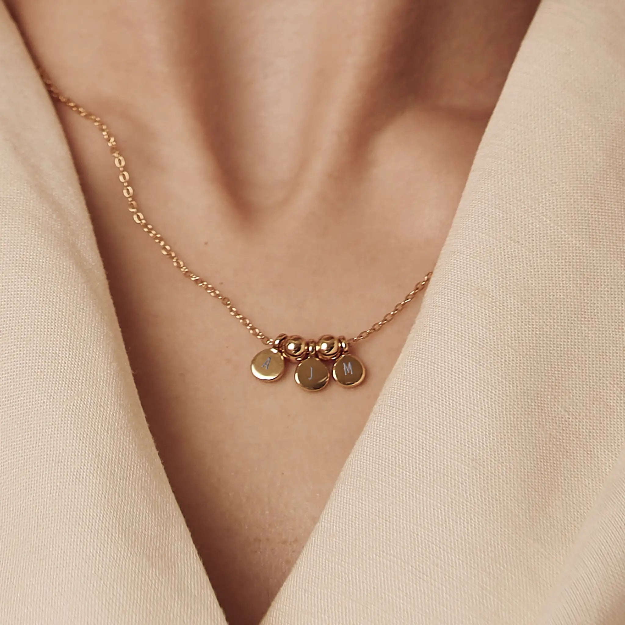 Family Initial Necklace in gold featuring three delicate engraved charms - meaningful jewellery gift - initial necklace gold