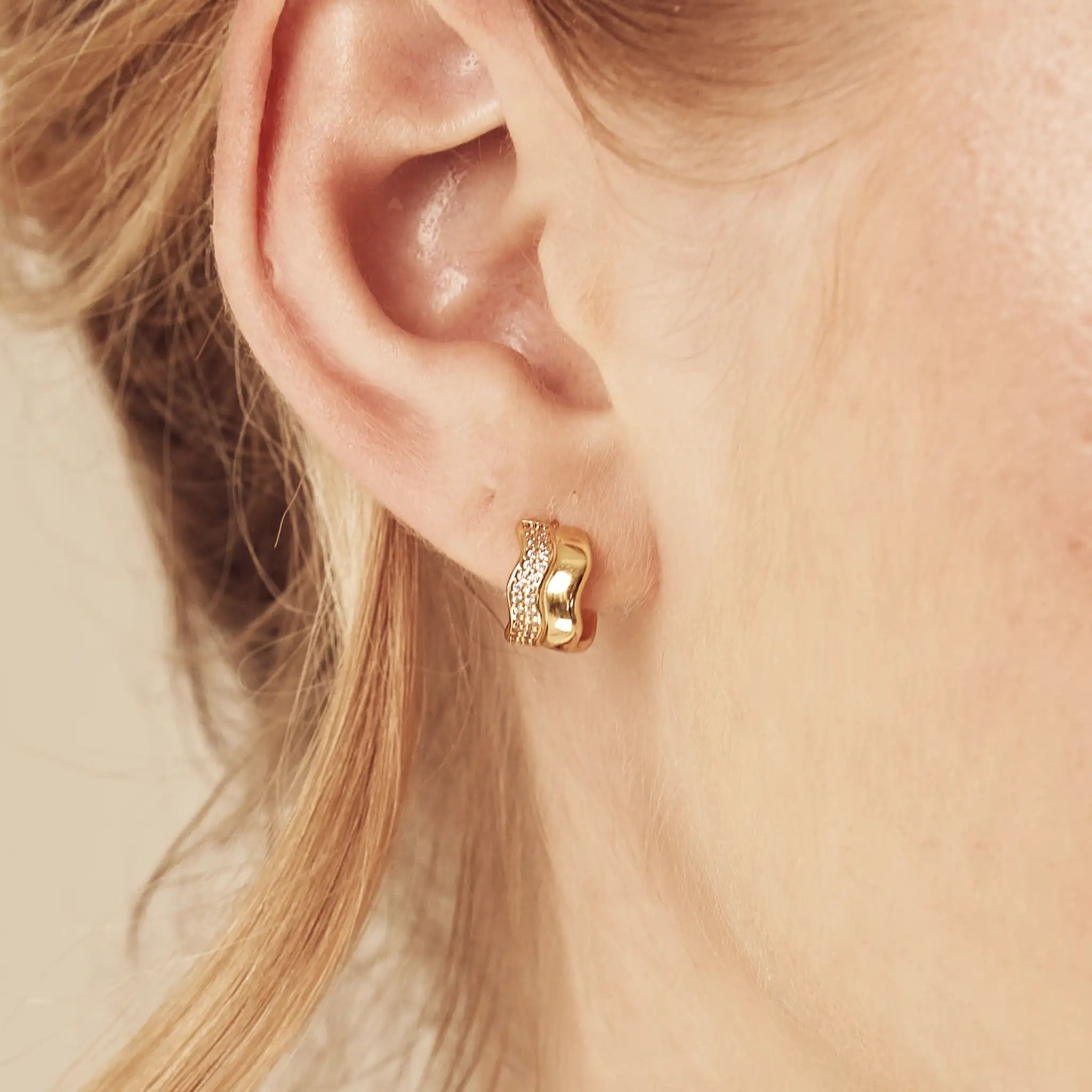 Gold Wave Stacking Earrings featuring huggie design and double crystal row - premium ear stack essential crafted from recycled sterling silver with 18k gold vermeil finish by Treatfully