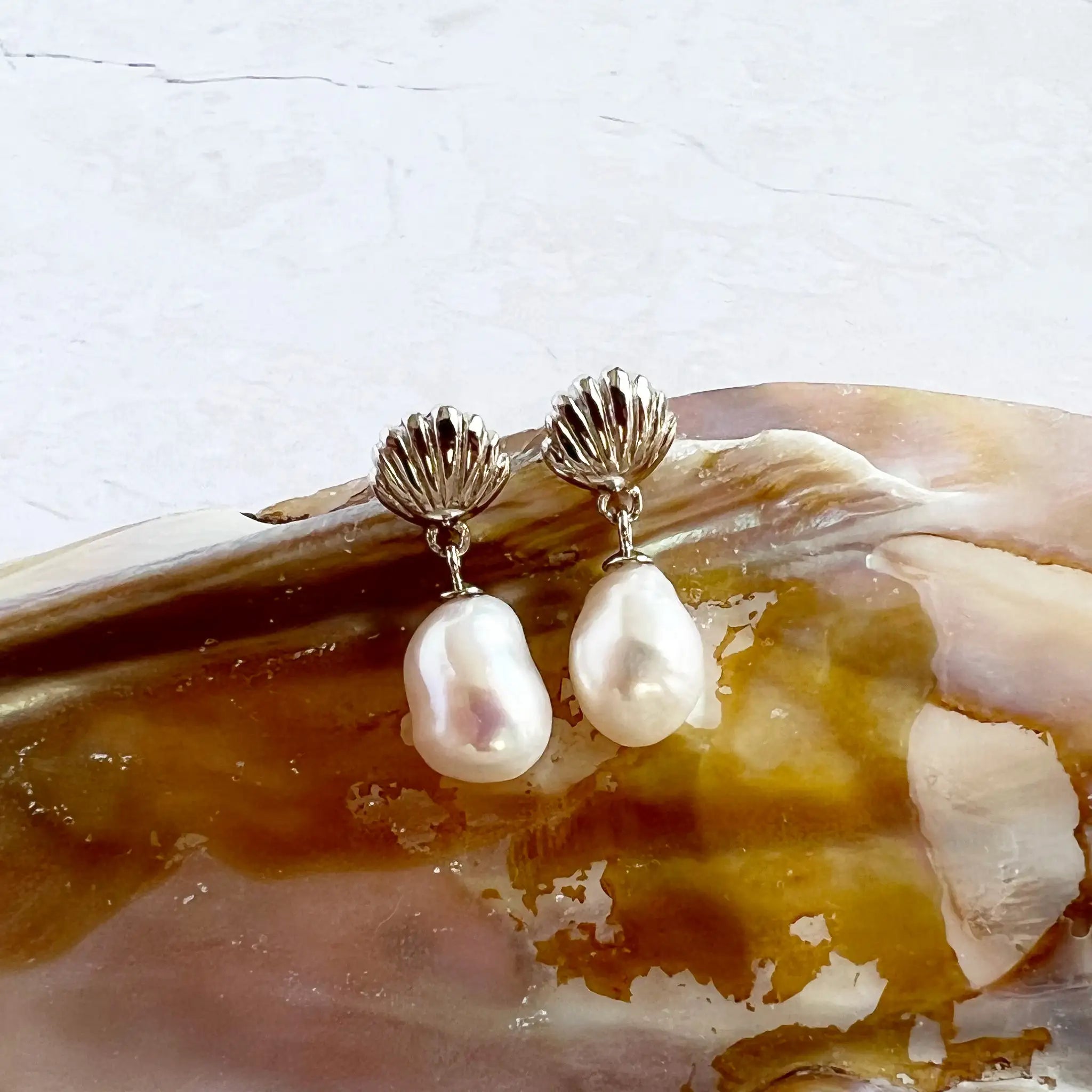 Sterling Silver Shell Earrings with baroque pearl drops - luxury sustainable jewelry inspired by ocean treasures