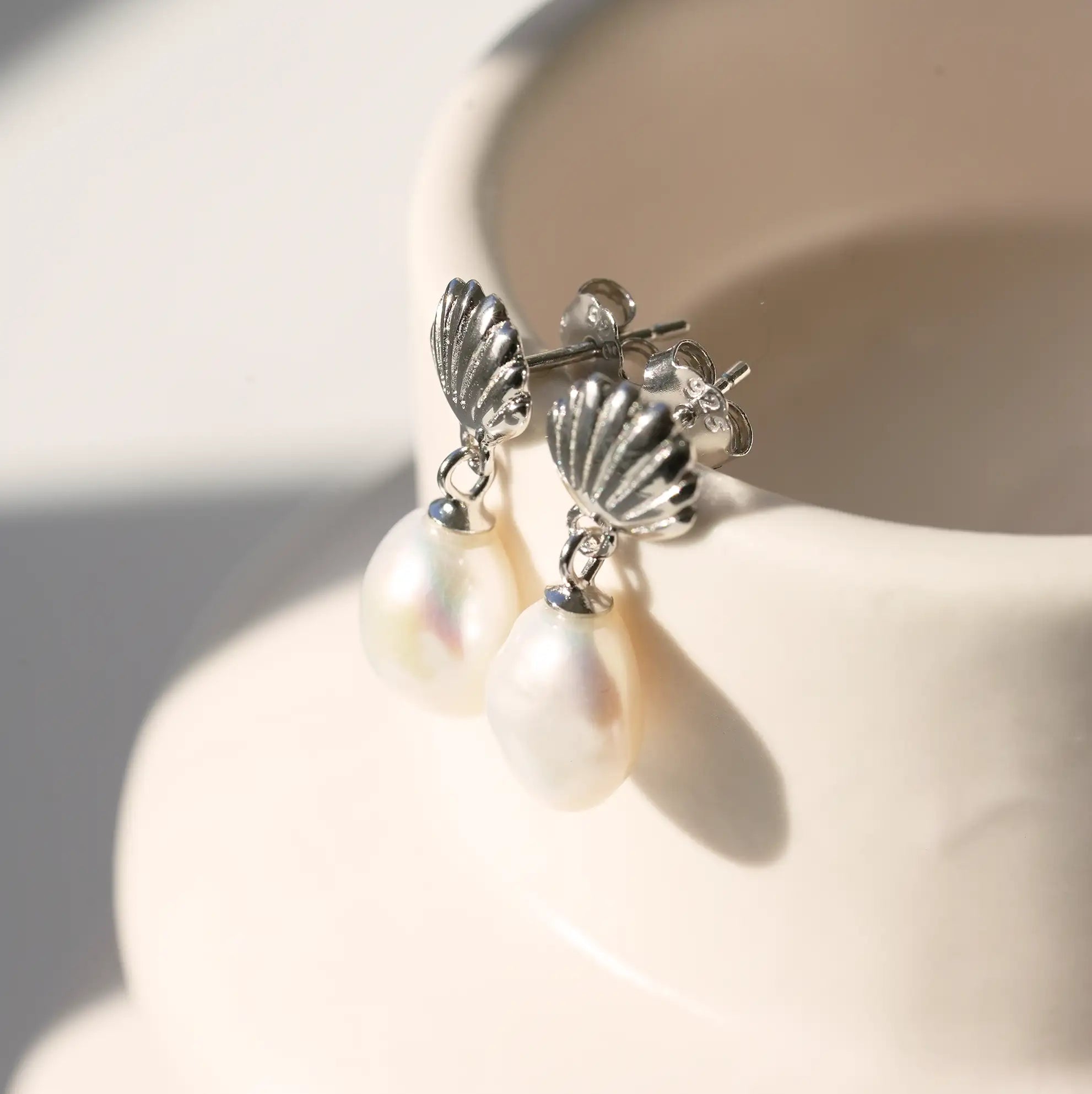 Organic Shell and Pearl Drop Earrings featuring genuine baroque freshwater pearls and recycled sterling silver