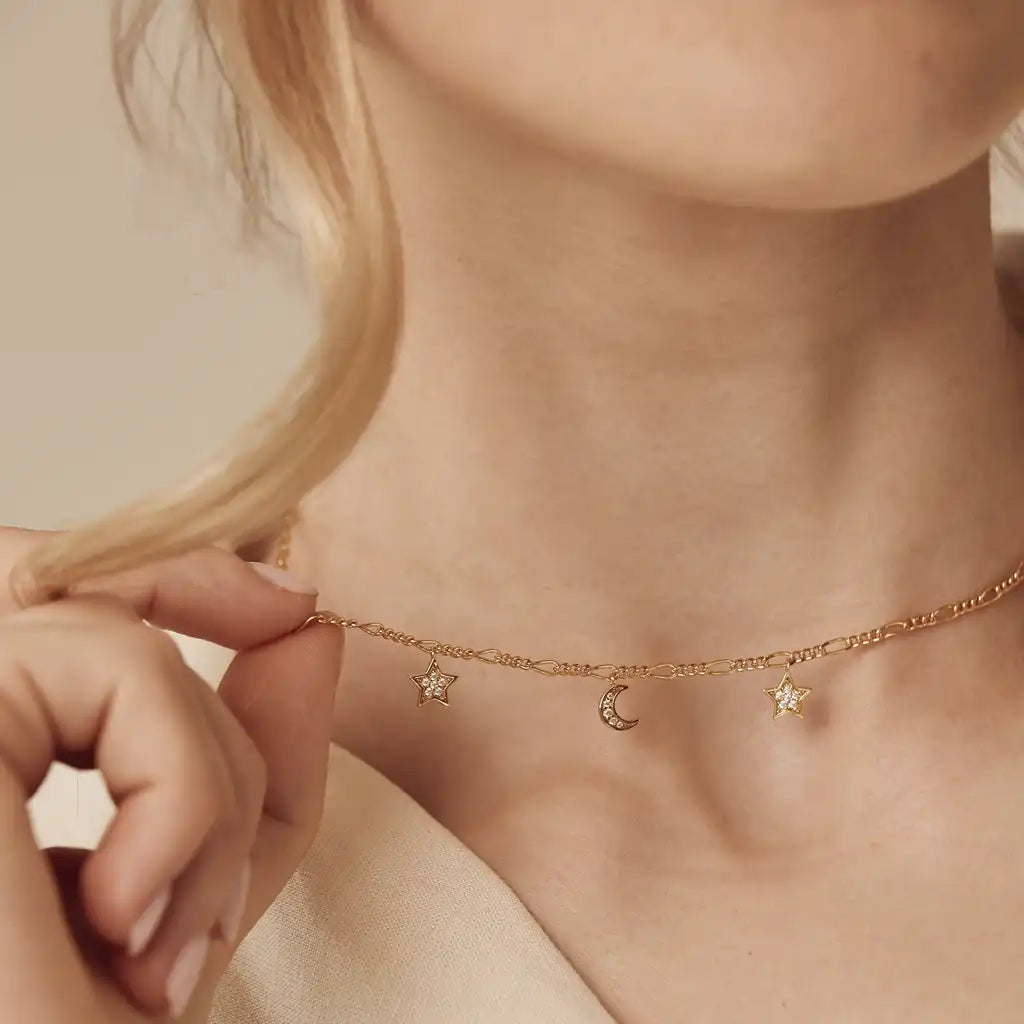 Celestial Moon and Stars Necklace in 18k gold vermeil featuring delicate cosmic charms on classic Figaro chain - premium jewelry for everyday magic by Treatfully