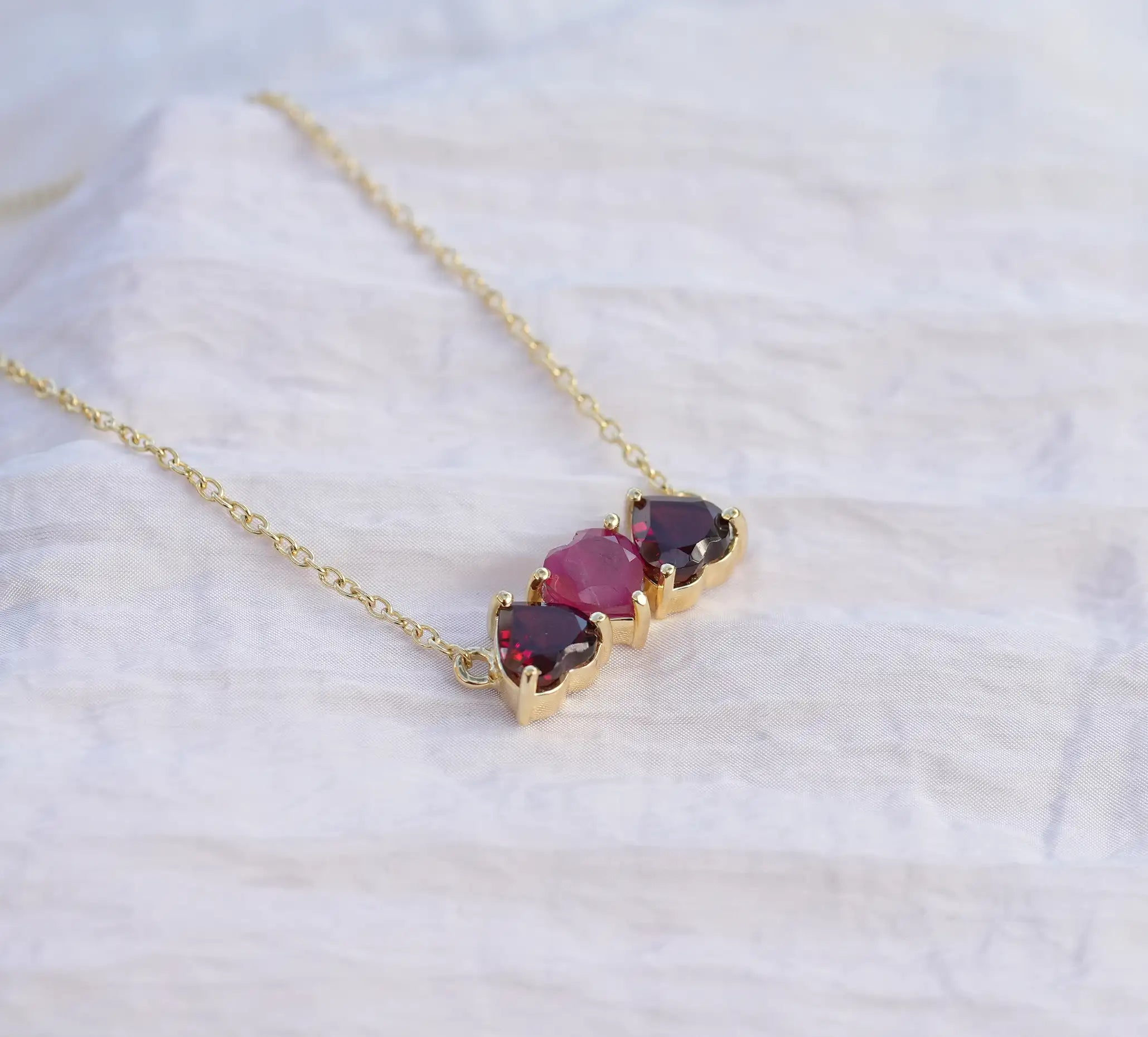 ruby and garnet necklace, heart necklace, trilogy hearts necklace, 3 heart necklace with ruby and garnet birthstones