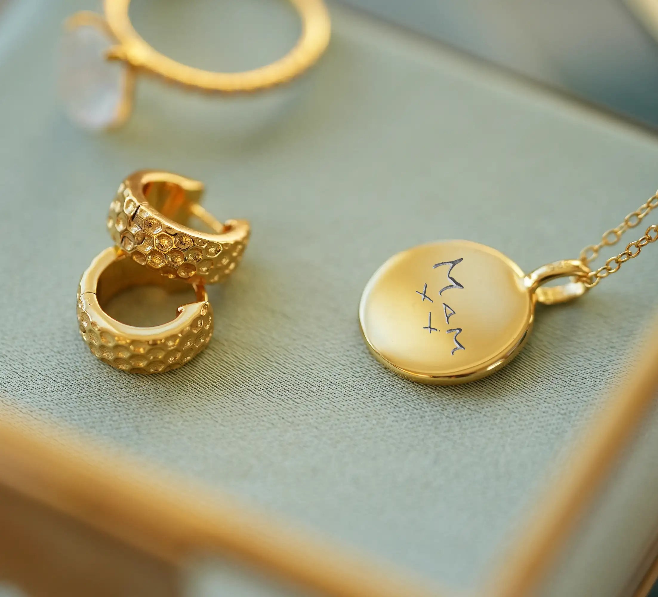 gold real handwriting necklace treatfully a round disc necklace with someone's real handwriting engraved onto the front