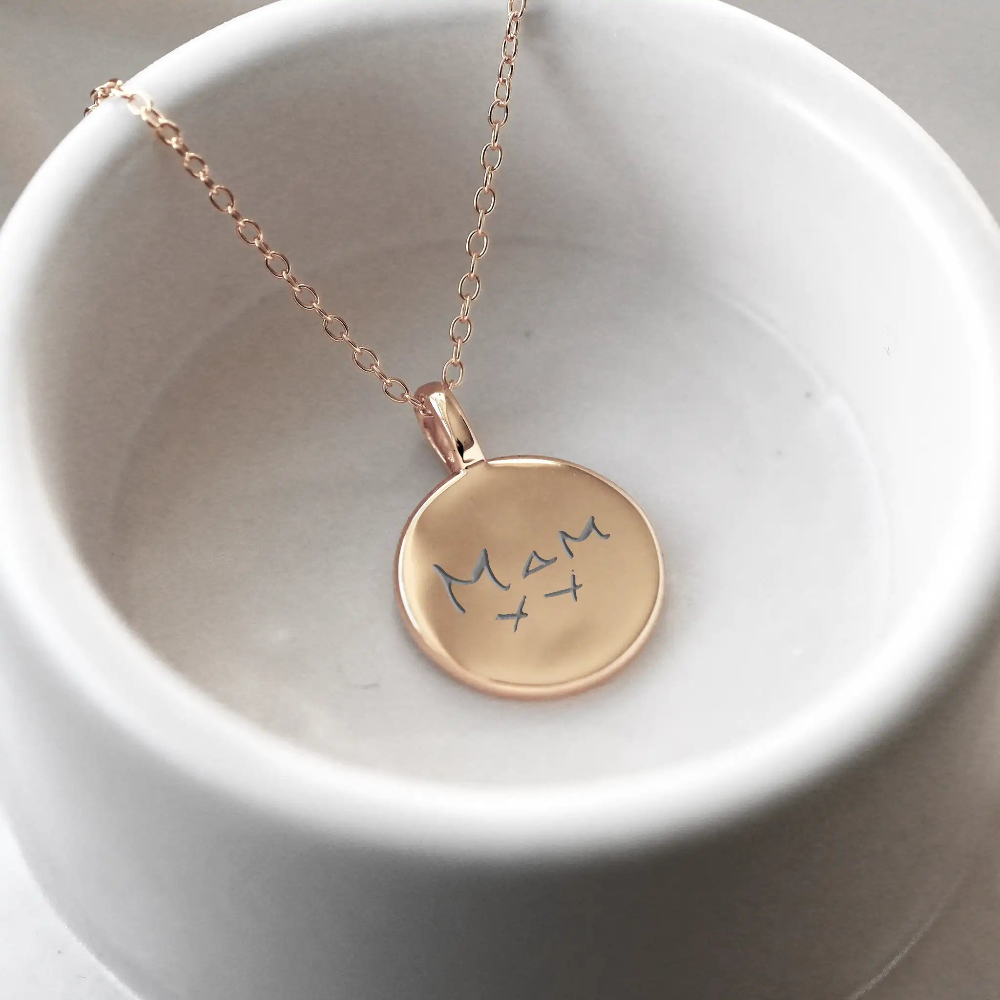 gold handwriting necklace disc necklace featuring the real handwriting of a loved one on it